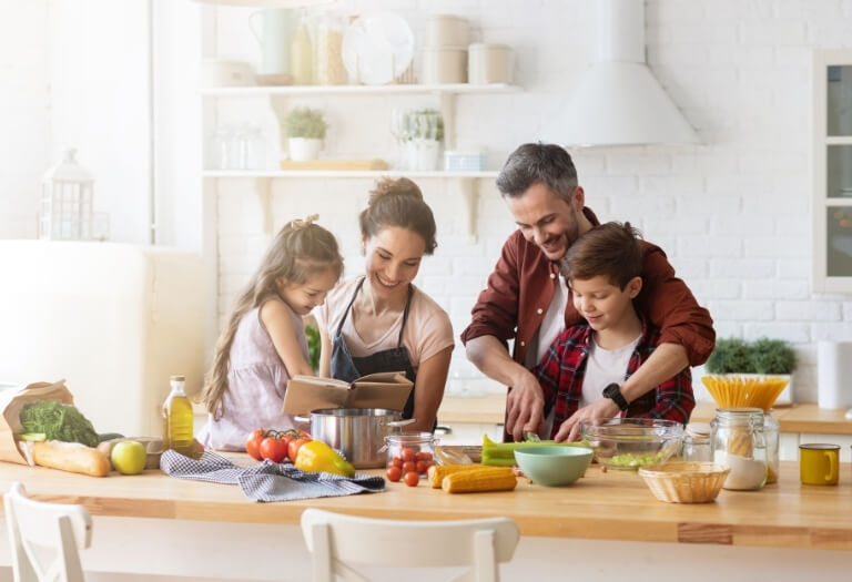 Happy family cooking together